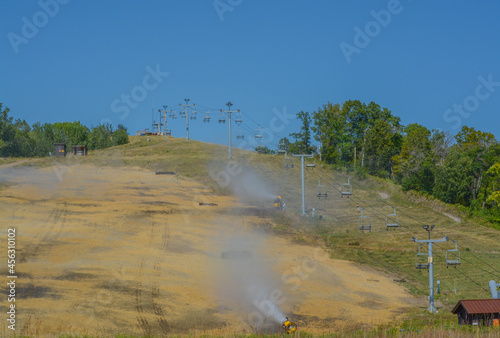 Minnesota's Detroit Mountain Recreation Area is being reseeded. On the down hill ski slope near the chair lifts photo