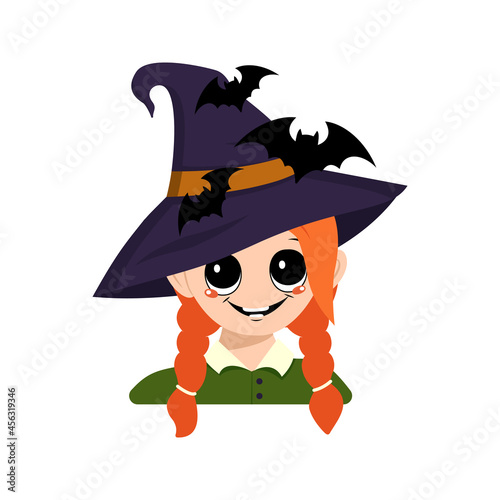 Avatar of a girl with red hair, big eyes and a wide happy smile in a pointed witch hat with a bats. The head of a child with a joyful face. Halloween party decoration