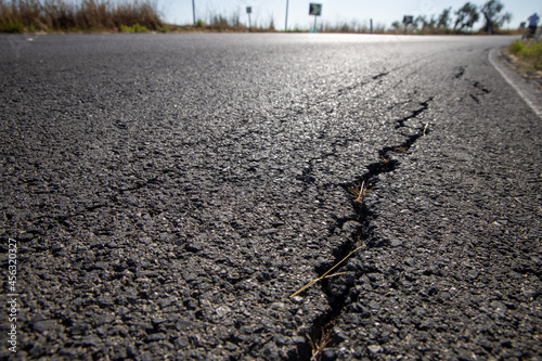 Close up of asphalt road surface crack