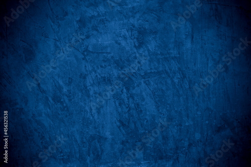 Old wall pattern texture cement blue dark abstract blue color design are light with black gradient background.