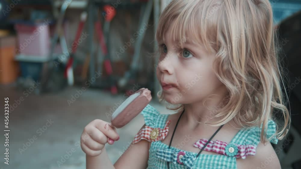 toddler eating ice cream outside toddler eating ice cream outside