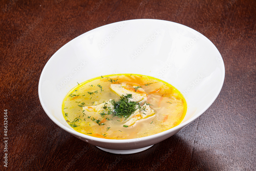 Chicken soup with vegetables and herbs