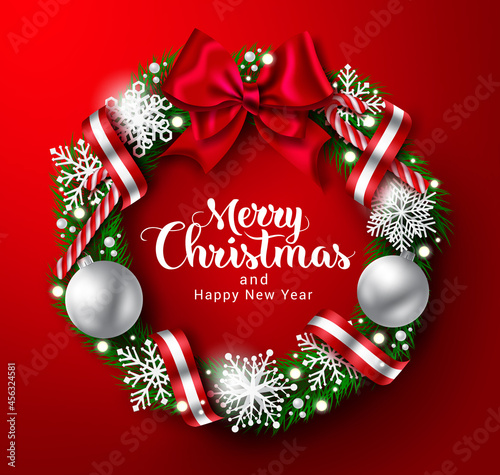 Christmas wreath vector design. Merry christmas text in wreath element with snowflakes, ball and candy cane decoration for xmas holiday season background. Vector illustration.
