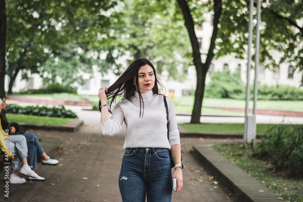 Stylish beautiful brunette girl in a summer city Stylish beautiful brunette girl in a summer city