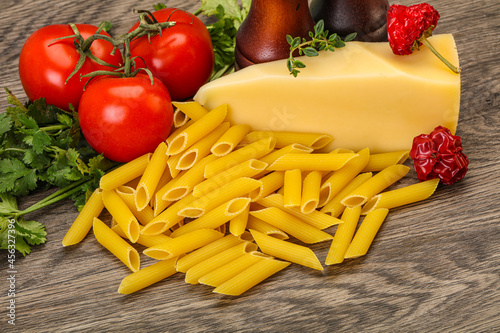 Raw penne rigate for cooking