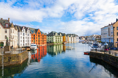 Canal with colorful houses in Alesund, Norway