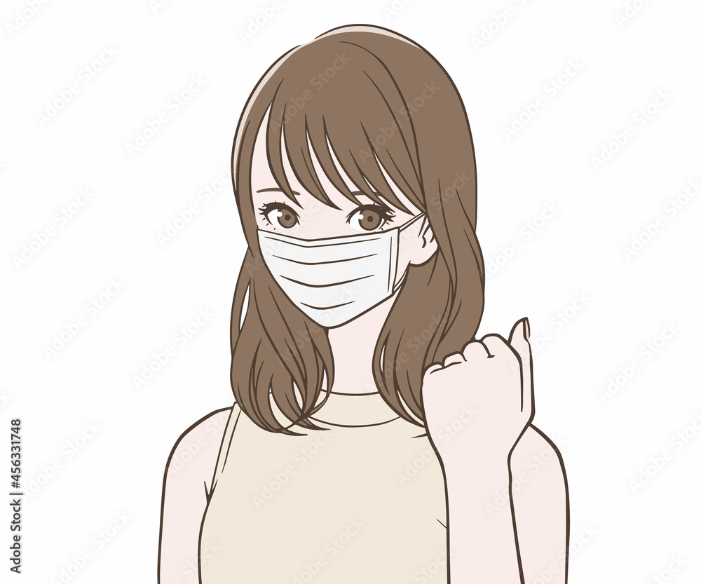 マスクをつけてガッツポーズをする女性