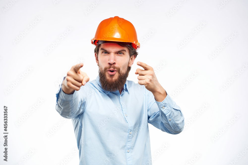 emotional man orange helmet on the head success isolated background