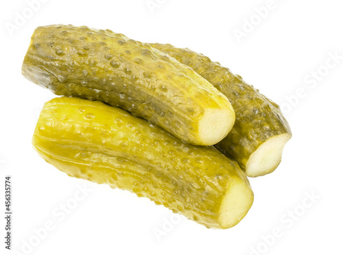 Pickled cucumbers isolated on white background. marinated pickles. salted cucumbers close up