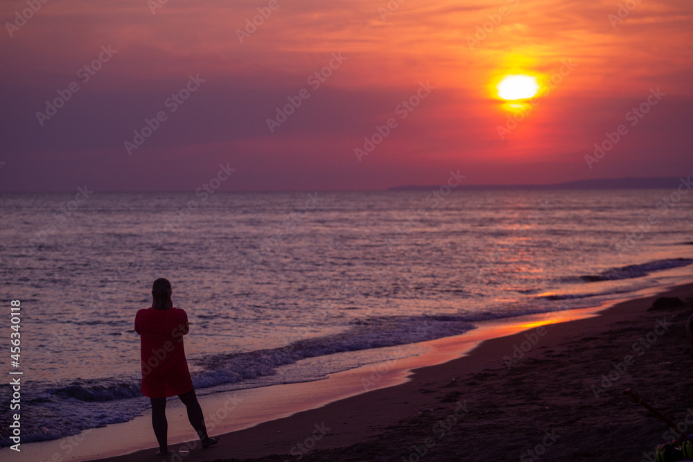 silhouette of a person on the beach