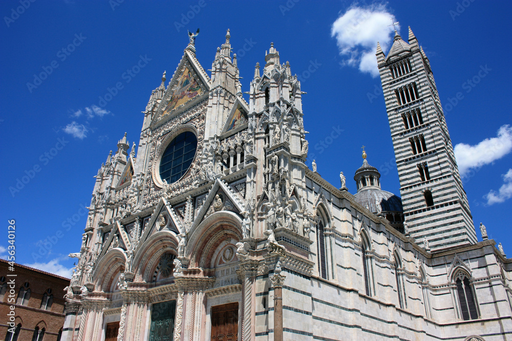 The Metropolitan Cathedral of Santa Maria Assunta or also the Duomo of Siena on a beautiful sunny day