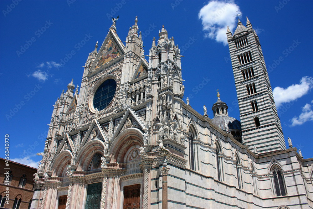 The Metropolitan Cathedral of Santa Maria Assunta or also the Duomo of Siena on a beautiful sunny day