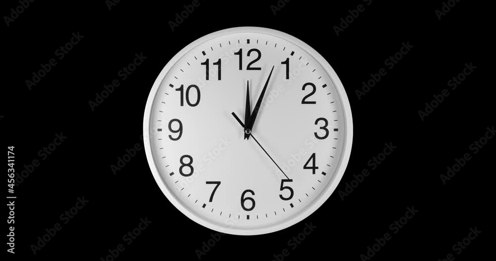 Clock Face Close Up in Time Lapse on black background. Clocks reverse running fast. Clock dial close-up isolated on a black background. Footage is perfect for the layer with different blending modes.