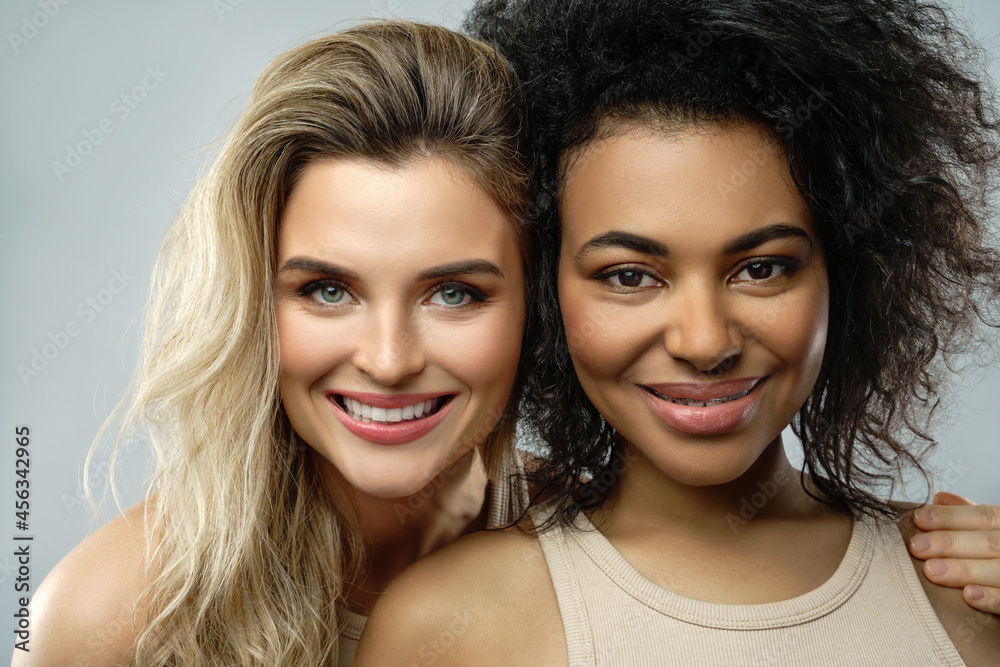 Portrait of Caucasian and African American women in studio
