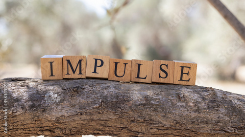The word impulse was created from wooden cubes. © Caner