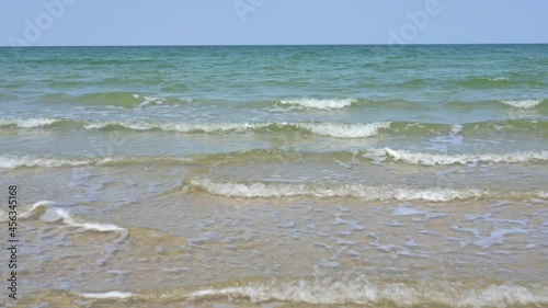 Movement towards the sea waves. Beautiful sea waves on a sunny day