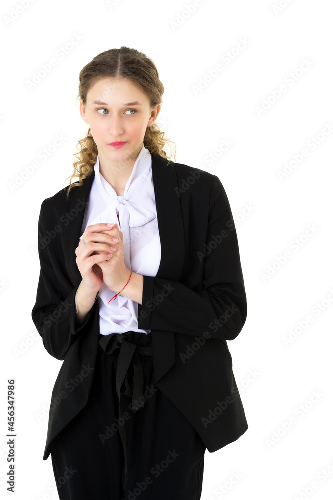 Upset student girl standing with hand on waist Upset student girl standing with hand on waist
