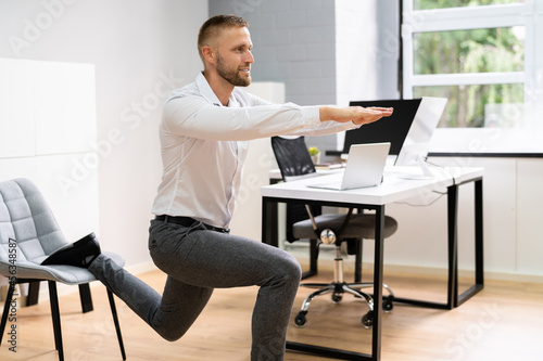 Standing Office Yoga Workout © Andrey Popov