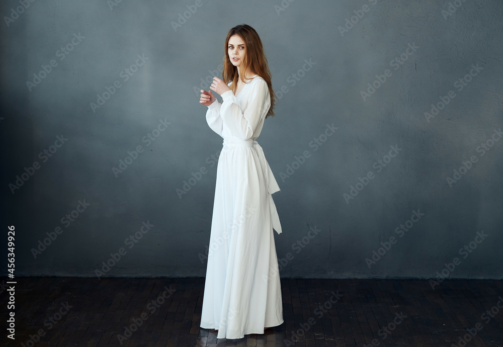 woman barefoot in white dress dancing on isolated background romance woman barefoot in white dress dancing on isolated background romance