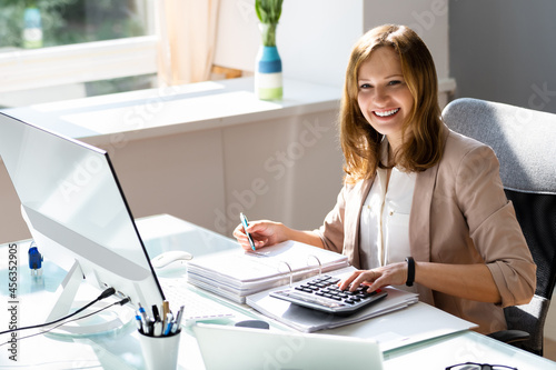 Professional Accountant Woman In Office Doing Accounting photo