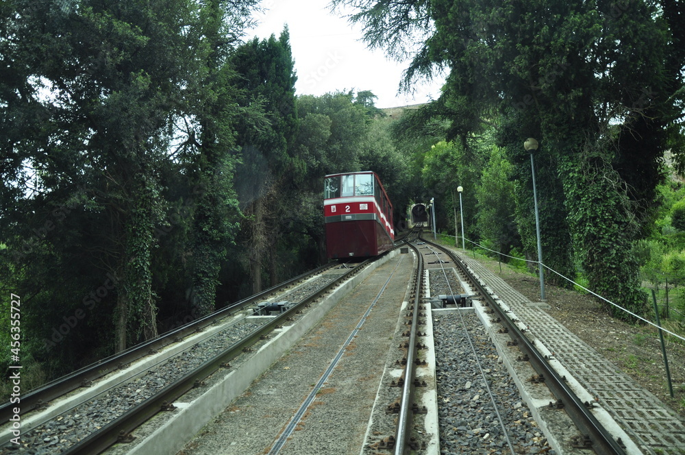 Naklejka premium Rail system vehicle entering the funicular tunnel