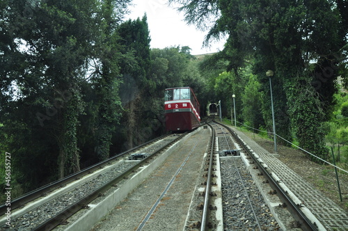 Fototapeta Naklejka Na Ścianę i Meble -  Rail system vehicle entering the funicular tunnel