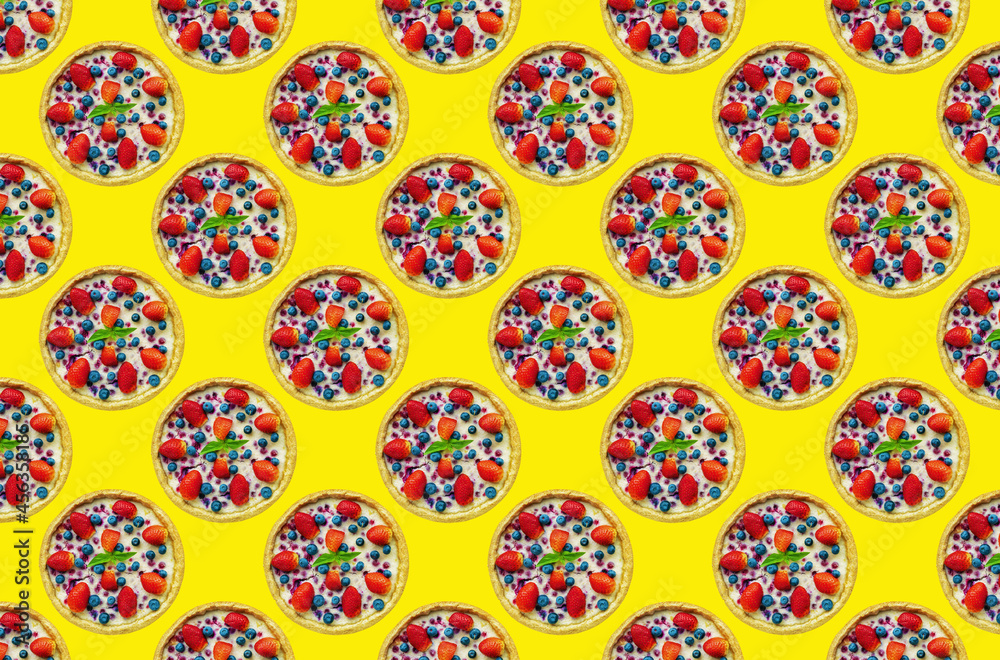 strawberry cheesecake multiplied in large quantities on colored background