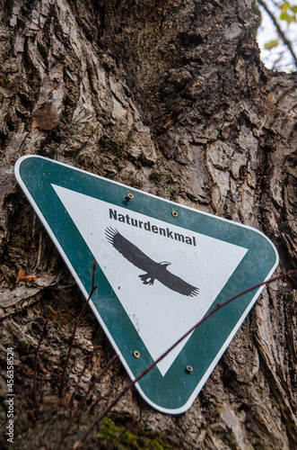 Signboard with the inscription Natural Monument in German language
