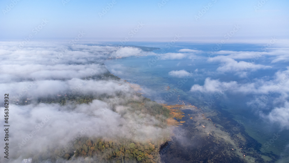 Aerial View from of the fog forest and the sea