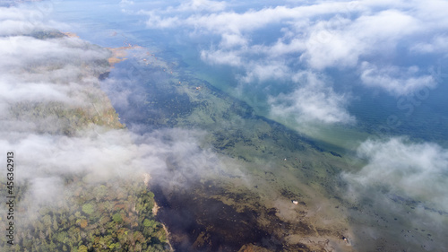 Aerial View from of the fog forest and the sea © photoexpert