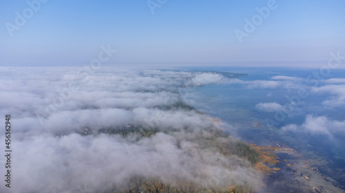 Aerial View from of the fog forest and the sea