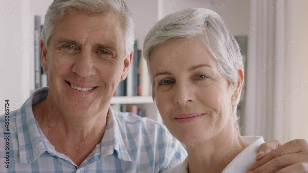 portrait happy old couple smiling enjoying retirement together sharing romantic anniversary embracing at home 4k footage portrait happy old couple smiling enjoying retirement together sharing romantic anniversary embracing at home 4k footage