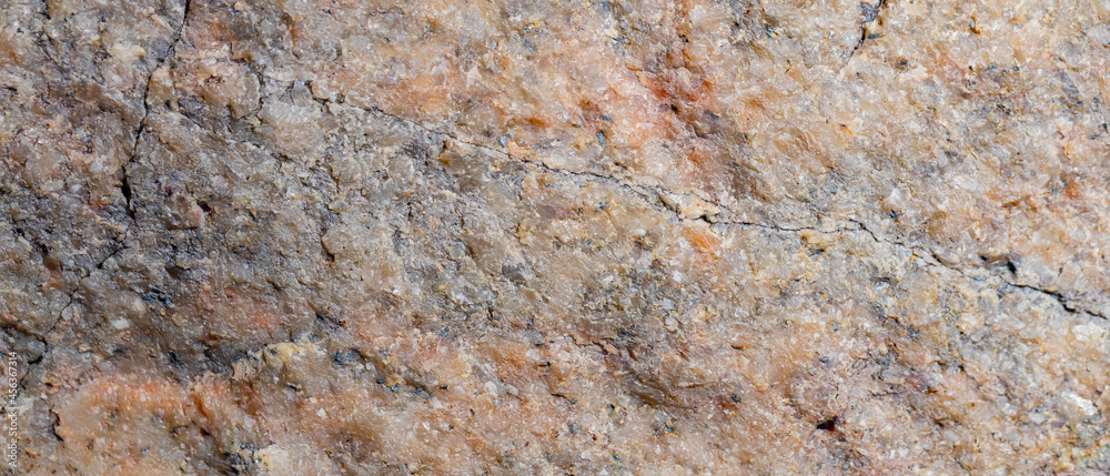 Granite surface. Texture of granite stone. Cracked natural stone surface. Copy space Granite surface. Texture of granite stone. Cracked natural stone surface. Copy space