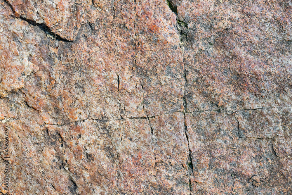 Granite surface. Texture of granite stone. Cracked natural stone surface. Copy space Granite surface. Texture of granite stone. Cracked natural stone surface. Copy space