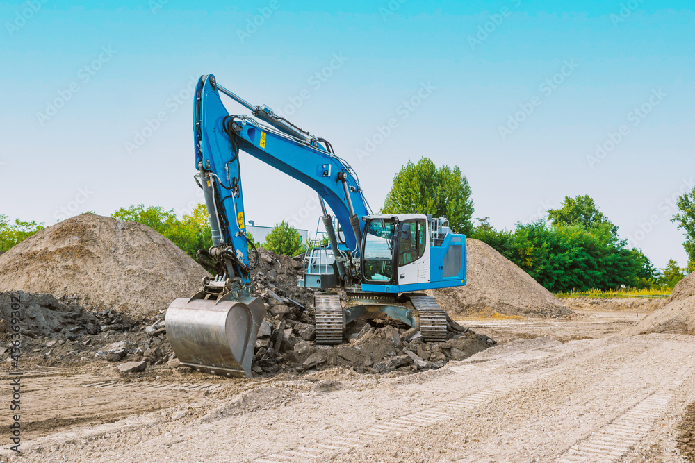 excavator doing demolition work on a construction site. Also called diggers, JCB, mechanical shovels, or 360-degree excavators excavator doing demolition work on a construction site. Also called diggers, JCB, mechanical shovels, or 360-degree excavators