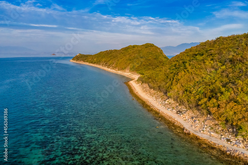 Diep Son island, where a road emerges in the middle of the sea during low tide, Nha Trang, Khanh Hoa, Vietnam. 