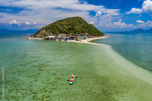 Diep Son island, where a road emerges in the middle of the sea during low tid...
