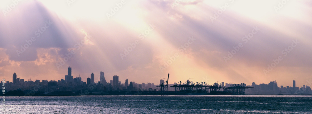 Beirut city skyline, Lebanon with rays of light falling from a cloud above the city, capital of Lebanon, shot before the blast that destroyed Beirut Harbor