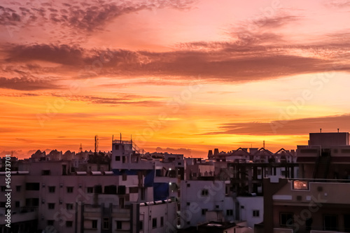 City sunset in the pink clouds and light blue sky © Sandeep T2