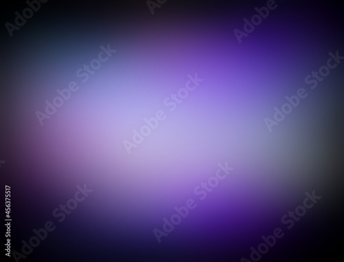 Blue violet shades dark blurred background with black vignette and spotlight in centre.