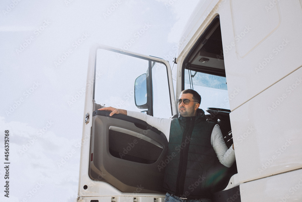Man driver of the lorry in a logistic company
