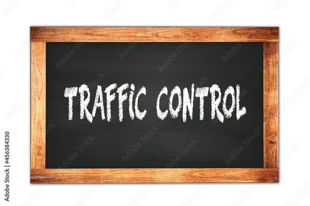 TRAFFIC CONTROL text written on wooden frame school blackboard. TRAFFIC CONTROL text written on wooden frame school blackboard.