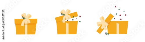 Gift box set. Yellow christmas present in different states, closed, slightly opened and opened. Small particles flying from the opened package.
