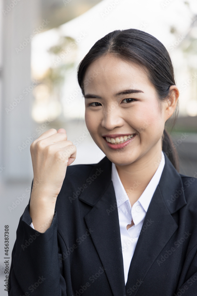Successful happy asian office worker or business woman Successful happy asian office worker or business woman