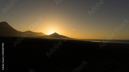 Sunset over Canary Island National Park, Fueteventura, Jandía with night sky looming over horizon with cliffs on the background