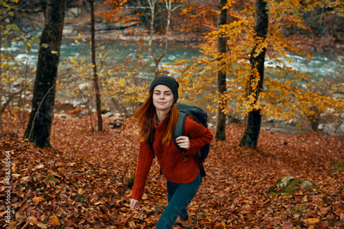 woman with backpack travel in autumn forest © SHOTPRIME STUDIO