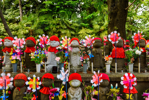 Jizo statues at Zojoji temple, Tokyo photo