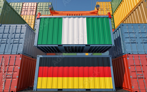 Freight containers with Germany and Nigeria national flags. 3D Rendering 