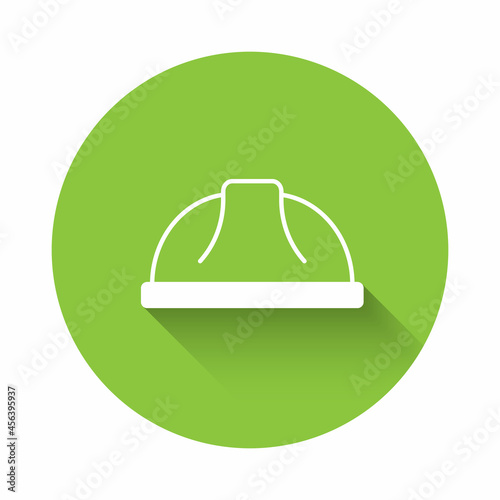White Worker safety helmet icon isolated with long shadow background. Green circle button. Vector