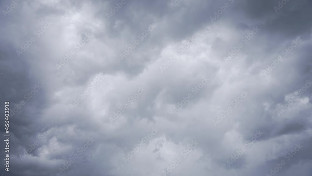 Pre-stormy gray sky over the Atlantic. Gray thick clouds cover the entire sky. Precipitation is expected. A storm warning. Overcast weather. Pre-stormy gray sky over the Atlantic. Gray thick clouds cover the entire sky. Precipitation is expected. A storm warning. Overcast weather.